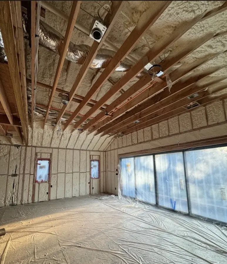 Interior walls and ceiling insulated with spray foam during new construction in Tipp City